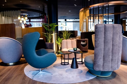 Hotel Motel One Frankfurt Messe Entrance Area with comfortable chairs and the Egg Chair