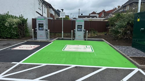 InstaVolt rapid EV charging station located at Co-Op Food on High Street, Bristol, featuring two user-friendly chargers with marked bays for electric vehicles