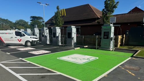 InstaVolt-branded van parked at McDonald's Warwick EV charging station, highlighting a full-service ultra rapid charging site for electric vehicles.