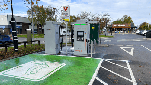 Ultra-rapid InstaVolt EV chargers at McDonald’s on Grearshill Road in Carlisle, with Greggs and other shops nearby.