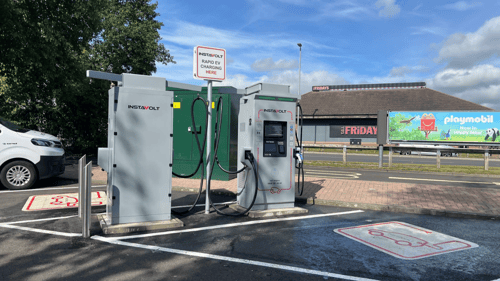 InstaVolt ultra-rapid EV chargers at Teesside Retail Park, Stockton-on-Tees, with clear EV bay markings and nearby TGI Fridays.