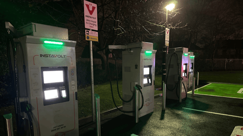 InstaVolt ultra-rapid EV chargers at McDonalds Queens Drive Liverpool at night