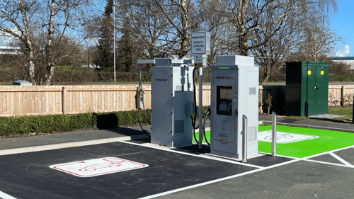 A close-up of InstaVolt ultra rapid EV chargers with clear signage, located at McDonald's on Shrewsbury Road, Oswestry.