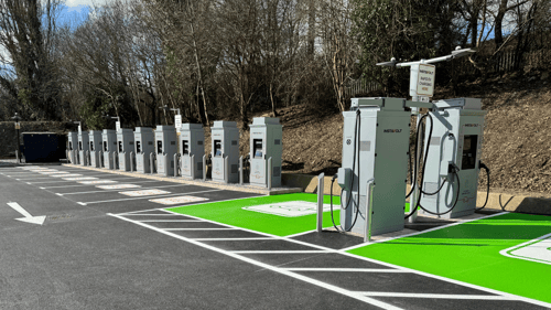 InstaVolt ultra rapid EV charging station at Stanier Close, Kettering, with multiple charge points and green parking bays.