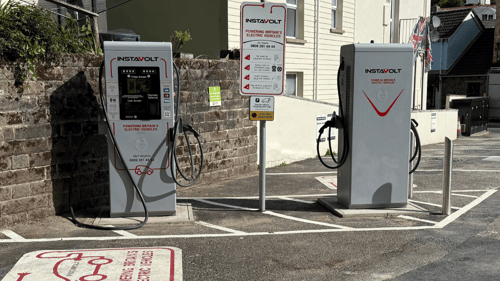 Two InstaVolt ultra rapid EV chargers in Glen Lyn Car Park, Ilfracombe, providing convenient electric vehicle charging with clear signage and marked bays.