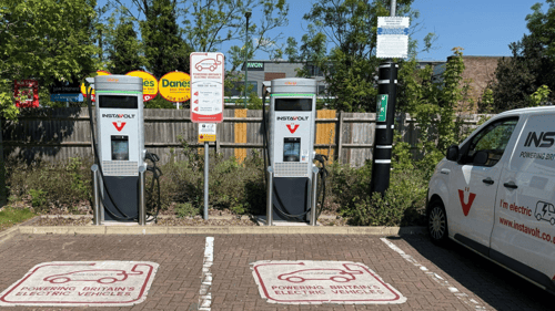 InstaVolt rapid EV chargers at KFC Shirley location with dedicated parking bays and an electric InstaVolt van.