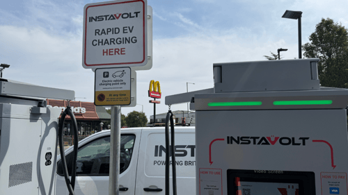 InstaVolt ultra-rapid EV chargers located next to a McDonald's with clear signage for electric vehicle charging only.