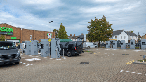 InstaVolt ultra-rapid EV chargers at ASDA Woking on Oriental Road, with multiple charging bays in a well-lit car park.