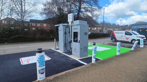 InstaVolt ultra rapid EV chargers at Co-op Bridport, featuring two charging units with a clearly marked charging bay and signage indicating rapid EV charging availability.