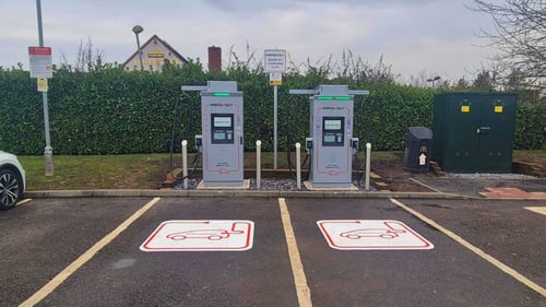 McDonald's Watchfield with InstaVolt EV chargers in the foreground, offering drivers a place to charge and grab food.