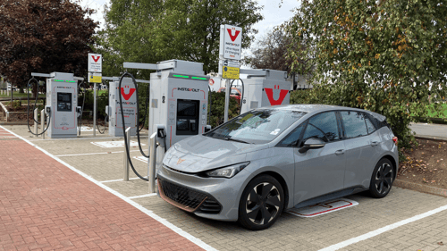 Electric vehicle charging at InstaVolt ultra-rapid chargers in Northampton.