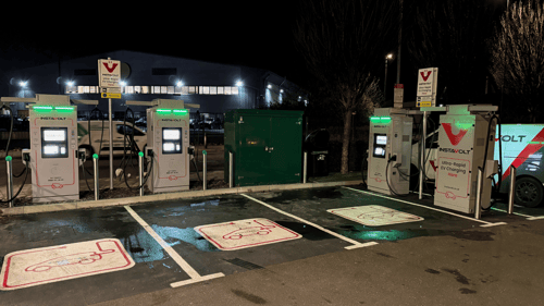 Ultra-rapid InstaVolt EV chargers at night outside McDonald's in Woolwich, London