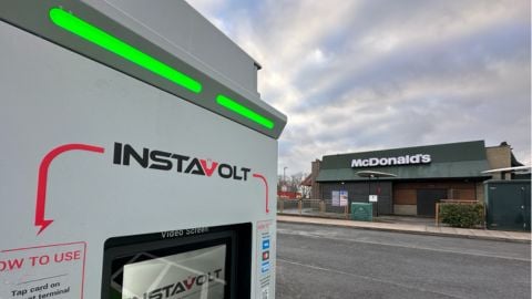 InstaVolt ultra rapid EV charger in the foreground with a McDonald's restaurant in the background at Berristow Lane, Alfreton, UK.