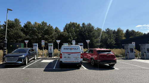 InstaVolt rapid and ultra-rapid EV chargers in use at a Starbucks site near the A168, with multiple electric vehicles charging.