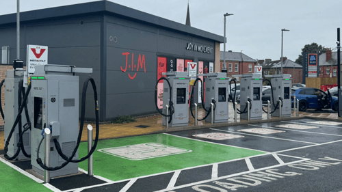 Overview of InstaVolt EV chargers and parking bays at Normanton Road, Derby, next to J.I.M's Gym and Starbucks, showcasing accessible charging and local amenities.