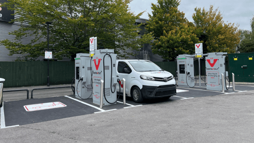 InstaVolt ultra-rapid EV chargers at Tollbar Way, Southampton, with a white Toyota electric van parked during charging.